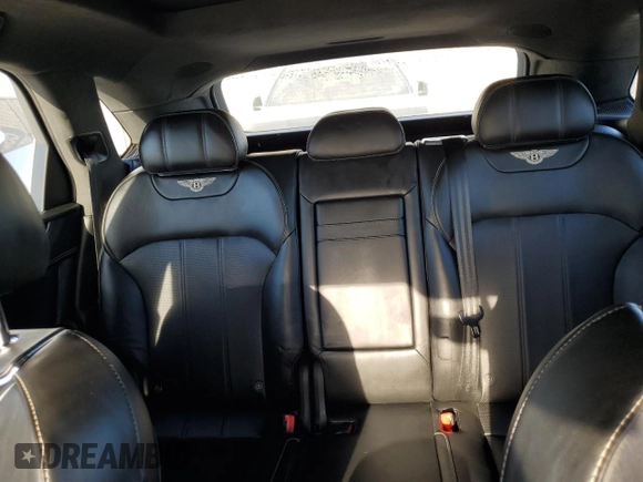 2019 Bentley Bentayga V8 z VIN SJAAM2ZV4KC024727, wystawiony jako Copart lot #80631684 z przebiegiem 38 304 mil mil oraz Nie do naprawy. Historia ofert i sprzedaży dostępna na DreamBid. Obrazek 9.