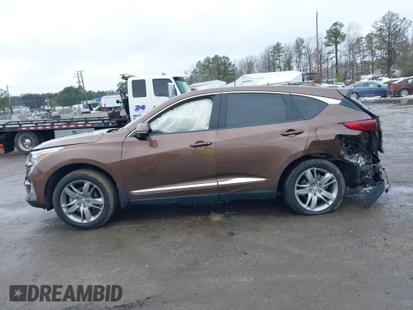 2019 Acura RDX w/Advance Pkg with VIN 5J8TC2H75KL017199, listed as a IAAI auction lot 41565130 with 67,880 mi miles. Bid and sale history available at carsss.com. Image 14.