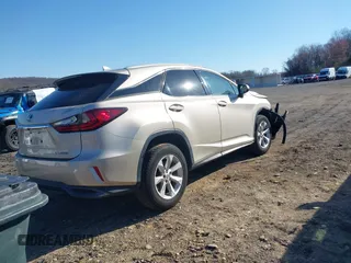 2016 Lexus RX 450h z VIN 2T2BGMCA7GC007006, wystawiony jako IAAI lot #41999343 z przebiegiem 124 912 mil mil oraz . Historia ofert i sprzedaży dostępna na DreamBid. Obrazek 4.