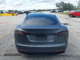 2023 Tesla Model S with VIN 5YJSA1E54PF501565, listed as a IAAI auction lot 42244953 with Not provided miles and . Bid and sale history available at DreamBid. Image 15.