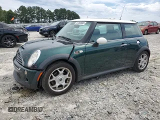 2006 MINI Hardtop S z VIN WMWRE335X6TN28621, wystawiony jako Copart lot #61369885 z przebiegiem 99 919 mil mil oraz Szkoda całkowita • Salvage title. Historia ofert i sprzedaży dostępna na DreamBid. Obrazek 1.