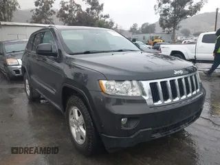 2011 Jeep Grand Cherokee Laredo z VIN 1J4RR4GG1BC566381, wystawiony jako IAAI lot #41547199 z przebiegiem 215 157 mil mil oraz . Historia ofert i sprzedaży dostępna na DreamBid. Obrazek 1.
