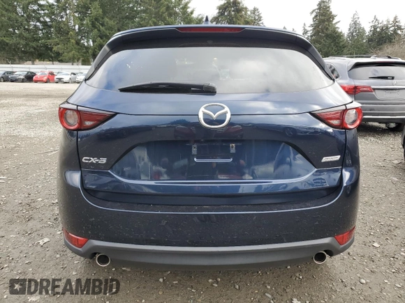 2018 Mazda CX-5 Touring with VIN JM3KFACM8J1349356, listed as a Copart auction lot 89154055 with 82,719 mi miles and Salvage Title. Bid and sale history available at carsss.com. Image 6.