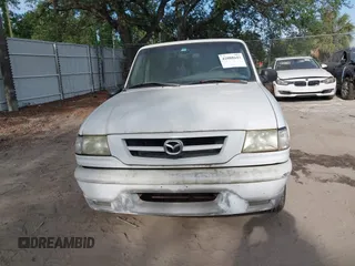 2002 Mazda B-Series Truck DS with VIN 4F4YR16V12TM23907, listed as a IAAI auction lot 42088643 with 247,760 mi miles and . Bid and sale history available at DreamBid. Image 6.