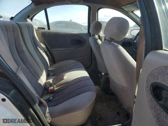 1996 Saturn SL with VIN 1G8ZK5279TZ162812, listed as a Copart auction lot 87079874 with 143,461 mi miles and Salvage Title. Bid and sale history available at carsss.com. Image 10.