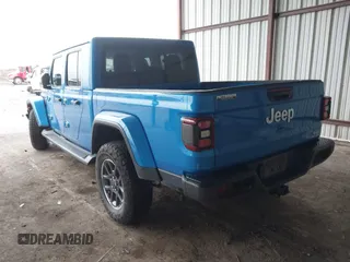 2020 Jeep Gladiator Overland with VIN 1C6HJTFG6LL212997, listed as a IAAI auction lot 41952950 with 60,803 mi miles and . Bid and sale history available at DreamBid. Image 3.