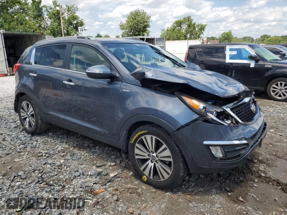 2014 Kia Sportage EX with VIN KNDPCCAC2E7629547, listed as a Copart auction lot 61255755 with 86,324 mi miles and Salvage title. Bid and sale history available at DreamBid. Image 4.