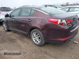 2013 Kia Optima LX with VIN 5XXGM4A70DG091393, listed as a IAAI auction lot 41823880 with 170,966 mi miles. Bid and sale history available at carsss.com. Image 3.