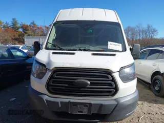 2017 Ford Transit z VIN 1FTYR2XM2HKA66787, wystawiony jako IAAI lot #40784197 z przebiegiem 161 147 mil mil oraz . Historia ofert i sprzedaży dostępna na DreamBid. Obrazek 13.