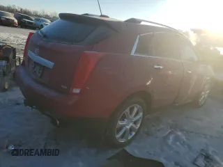 2015 Cadillac SRX Performance Collection with VIN 3GYFNFE39FS556708, listed as a Copart auction lot 41670355 with 177,601 mi miles and Salvage title. Bid and sale history available at DreamBid. Image 3.