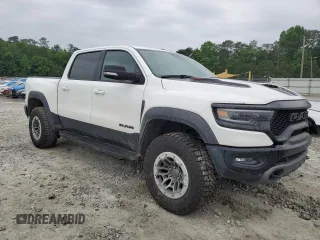 2021 Ram 1500 TRX with VIN 1C6SRFU97MN745516, listed as a Copart auction lot 49011924 with 0 mi miles and Salvage Title. Bid and sale history available at carsss.com. Image 4.