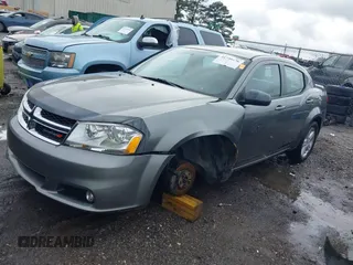 2013 Dodge Avenger SXT with VIN 1C3CDZCB5DN621881, listed as a IAAI auction lot 41739476 with 245,816 mi miles and . Bid and sale history available at DreamBid. Image 2.