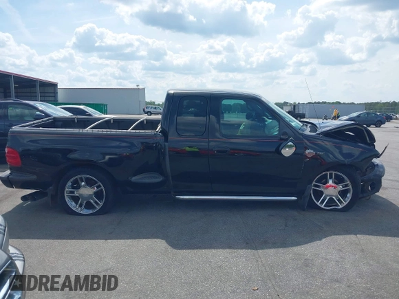 2000 Ford F-150 XL z VIN 2FTRX07L9YCA98355, wystawiony jako IAAI lot #42123587 z przebiegiem 191 000 mil mil oraz . Historia ofert i sprzedaży dostępna na DreamBid. Obrazek 13.