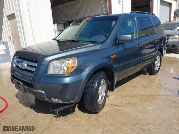 2006 Honda Pilot EX-L with VIN 5FNYF28556B003516, listed as a IAAI auction lot 42013495 with 207,443 mi miles. Bid and sale history available at carsss.com. Image 2.