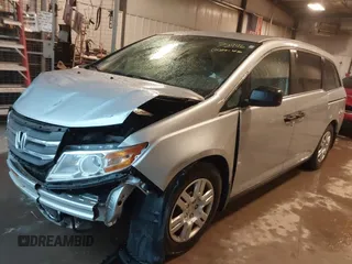 2012 Honda Odyssey LX with VIN 5FNRL5H27CB092988, listed as a IAAI auction lot 41933507 with 123,233 mi miles and . Bid and sale history available at DreamBid. Image 2.