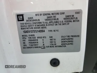 2007 GMC Acadia SLE z VIN 1GKEV13737J142664, wystawiony jako Copart lot #56377415 z przebiegiem 192 353 mil mil oraz Szkoda całkowita • Salvage title. Historia ofert i sprzedaży dostępna na DreamBid. Obrazek 13.