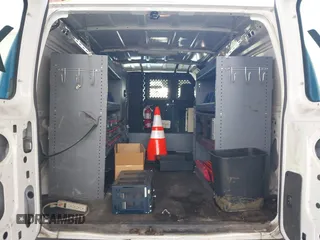2011 Ford Econoline Cargo Commercial with VIN 1FTNE2EL5BDB35198, listed as a IAAI auction lot 42181448 with 205,128 mi miles and . Bid and sale history available at DreamBid. Image 8.