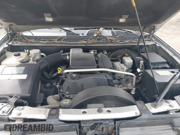 2004 GMC Envoy SLE with VIN 1GKDT13S142219365, listed as a IAAI auction lot 41612594 with 72,292 mi miles. Bid and sale history available at carsss.com. Image 10.