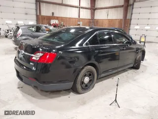 2015 Ford Sedan Police Interceptor with VIN 1FAHP2MK1FG188992, listed as a IAAI auction lot 41993150 with 39,930 mi miles. Bid and sale history available at carsss.com. Image 4.