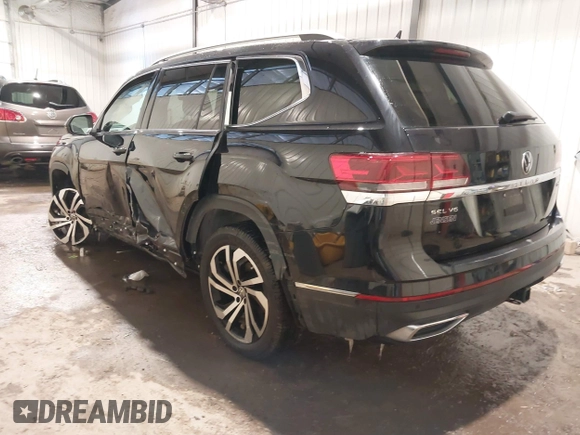 2021 Volkswagen Atlas SEL Premium z VIN 1V2TR2CAXMC577785, wystawiony jako IAAI lot #41613198 z przebiegiem 81 712 mil mil oraz . Historia ofert i sprzedaży dostępna na DreamBid. Obrazek 3.