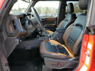 2023 Ford Bronco с VIN 1FMDE5DH0PLB63705, выставлен на аукционе Copart как лот 53321445 с пробегом 19 498 миль миль и Списание • Salvage title. История ставок и продаж доступна на DreamBid. Изображение 7.