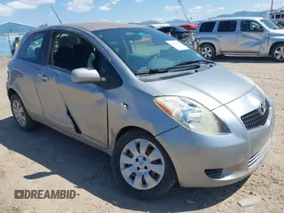 2007 Toyota Yaris z VIN JTDJT923875094794, wystawiony jako IAAI lot #42094923 z przebiegiem 156 490 mil mil oraz . Historia ofert i sprzedaży dostępna na DreamBid. Obrazek 1.