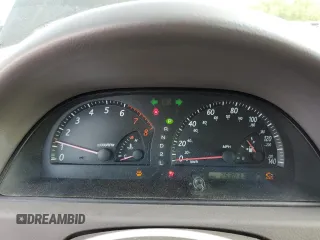 2002 Toyota Camry XLE z VIN 4T1BF32K02U034535, wystawiony jako Copart lot #53894995 z przebiegiem 253 037 mil mil oraz Szkoda całkowita • Salvage title. Historia ofert i sprzedaży dostępna na DreamBid. Obrazek 9.