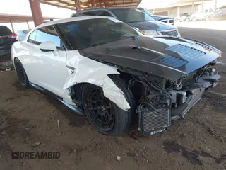 2019 Nissan GT-R Premium z VIN JN1AR5EF5KM750058, wystawiony jako IAAI lot #41736451 z przebiegiem 36 626 mil mil oraz . Historia ofert i sprzedaży dostępna na DreamBid. Obrazek 1.