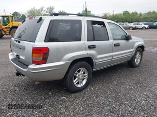 2004 Jeep Grand Cherokee Laredo with VIN 1J4GW48N34C145956, listed as a IAAI auction lot 42201114 with 137,815 mi miles and . Bid and sale history available at DreamBid. Image 4.