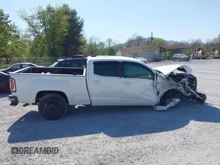 2019 GMC Canyon 4WD SLE z VIN 1GTG6CEN0K1353094, wystawiony jako IAAI lot #42065160 z przebiegiem 73 235 mil mil oraz . Historia ofert i sprzedaży dostępna na DreamBid. Obrazek 13.