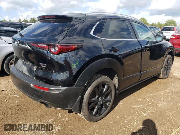 2022 Mazda CX-30 2.5 Turbo with VIN 3MVDMBAY0NM447128, listed as a Copart auction lot 54007924 with 10,596 mi miles and Salvage Title. Bid and sale history available at DreamBid. Image 3.