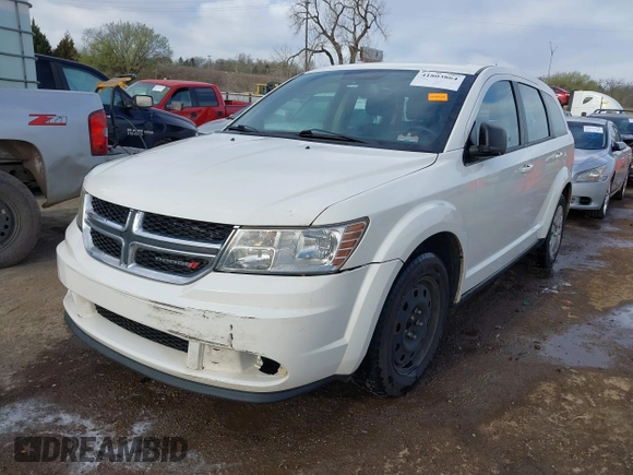 2014 Dodge Journey American Value with VIN 3C4PDCAB1ET209973, listed as a IAAI auction lot 41803864 with 168,774 mi miles and . Bid and sale history available at DreamBid. Image 2.