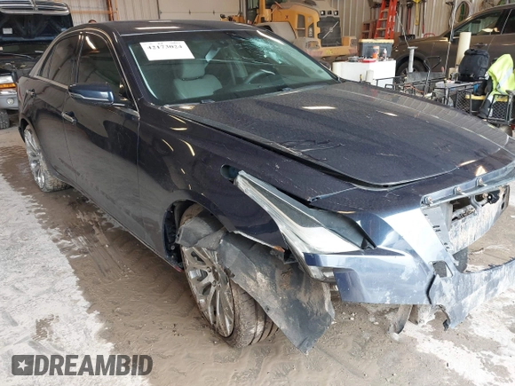2015 Cadillac CTS AWD z VIN 1G6AW5SXXF0136481, wystawiony jako IAAI lot #42173024 z przebiegiem 128 984 mil mil oraz . Historia ofert i sprzedaży dostępna na DreamBid. Obrazek 12.