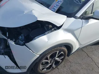 2019 Toyota C-HR XLE with VIN JTNKHMBX4K1040772, listed as a IAAI auction lot 41812031 with 79,729 mi miles. Bid and sale history available at carsss.com. Image 18.