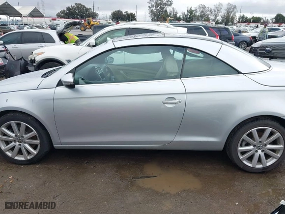 2009 Volkswagen Eos Komfort with VIN WVWBA71F29V016167, listed as a IAAI auction lot 41521053 with NaN miles. Bid and sale history available at carsss.com. Image 14.