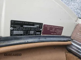 1987 Mercedes-Benz 560 with VIN WDBBA48D5HA061899, listed as a Copart auction lot 76554184 with 68,292 mi miles and Salvage Title. Bid and sale history available at carsss.com. Image 10.