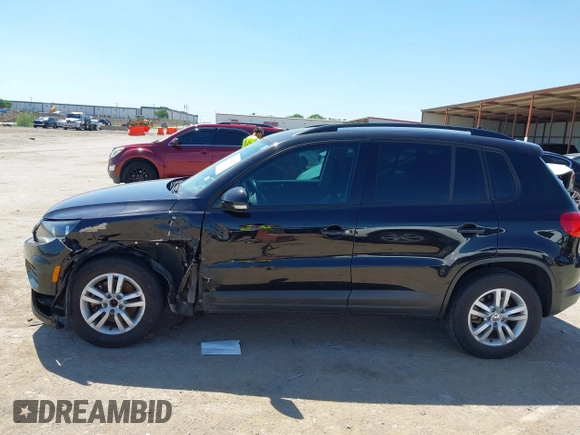 2015 Volkswagen Tiguan SE with VIN WVGAV7AX1FW558855, listed as a IAAI auction lot 42064427 with 58,584 mi miles and . Bid and sale history available at DreamBid. Image 14.