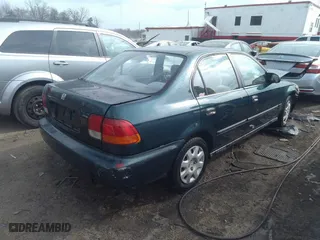 1998 Honda Civic LX with VIN 2HGEJ6676WH602966, listed as a IAAI auction lot 39722428 with 153,245 mi miles. Bid and sale history available at carsss.com. Image 4.