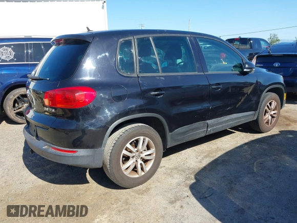 2012 Volkswagen Tiguan LE with VIN WVGAV7AX1CW557250, listed as a IAAI auction lot 42300694 with 122,310 mi miles and . Bid and sale history available at DreamBid. Image 4.