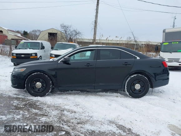 2014 Ford Police Interceptor with VIN 1FAHP2MK9EG101144, listed as a IAAI auction lot 41449872 with 160,659 mi miles and . Bid and sale history available at DreamBid. Image 14.