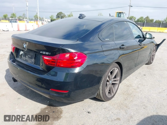 2015 BMW 4 Series 428i z VIN WBA4A9C5XFD416873, wystawiony jako IAAI lot #42108645 z przebiegiem 93 433 mil mil oraz . Historia ofert i sprzedaży dostępna na DreamBid. Obrazek 4.