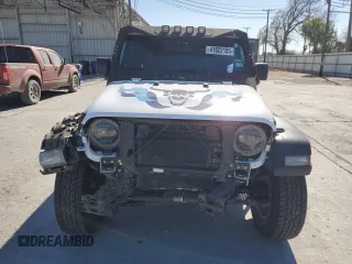2023 Jeep Wrangler Sport S with VIN 1C4HJXDG3PW522449, listed as a Copart auction lot 41622185 with 25,436 mi miles and Salvage Title. Bid and sale history available at DreamBid. Image 5.