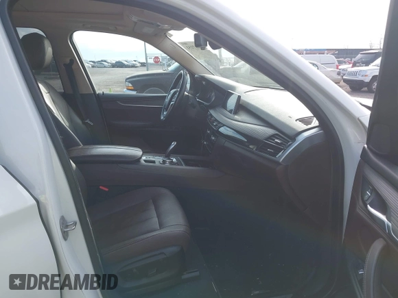 2016 BMW X5 xDrive35i with VIN 5UXKR0C5XG0P21683, listed as a IAAI auction lot 41717151 with 98,696 mi miles. Bid and sale history available at carsss.com. Image 5.