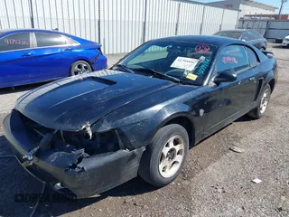 2004 Ford Mustang Standard with VIN 1FAFP40604F156534, listed as a IAAI auction lot 41794486 with 216,207 mi miles. Bid and sale history available at carsss.com. Image 18.