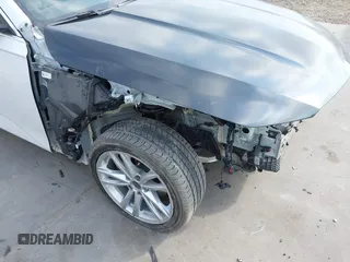 2022 Cadillac CT4 Luxury z VIN 1G6DJ5RK3N0114231, wystawiony jako IAAI lot #42064458 z przebiegiem 18 753 mil mil oraz . Historia ofert i sprzedaży dostępna na DreamBid. Obrazek 18.