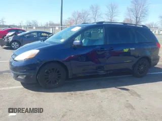2007 Toyota Sienna XLE with VIN 5TDZK22C07S056161, listed as a IAAI auction lot 41820123 with 206,675 mi miles. Bid and sale history available at carsss.com. Image 6.