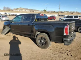 2021 GMC Canyon 4WD AT4 w/Cloth with VIN 1GTG6FEN9M1254293, listed as a Copart auction lot 87163874 with 33,645 mi miles and Salvage Title. Bid and sale history available at carsss.com. Image 2.