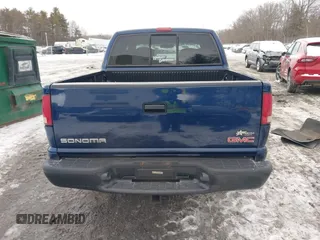 2002 GMC Sonoma SLS with VIN 1GTDT13W12K158613, listed as a IAAI auction lot 41524710 with 217,785 mi miles. Bid and sale history available at carsss.com. Image 16.