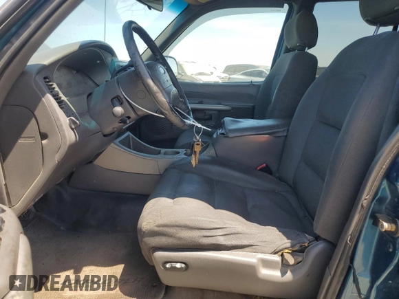 2001 Ford Explorer Sport Trac с VIN 1FMZU67E81UB99076, выставлен на аукционе Copart как лот 62218565 с пробегом 213 872 миль миль и Чистый • Clean title. История ставок и продаж доступна на DreamBid. Изображение 7.