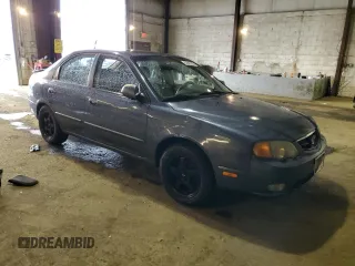 2003 Kia Spectra GS z VIN KNAFB161135104592, wystawiony jako Copart lot #52097205 z przebiegiem 119 206 mil mil oraz Szkoda całkowita • Salvage title. Historia ofert i sprzedaży dostępna na DreamBid. Obrazek 4.